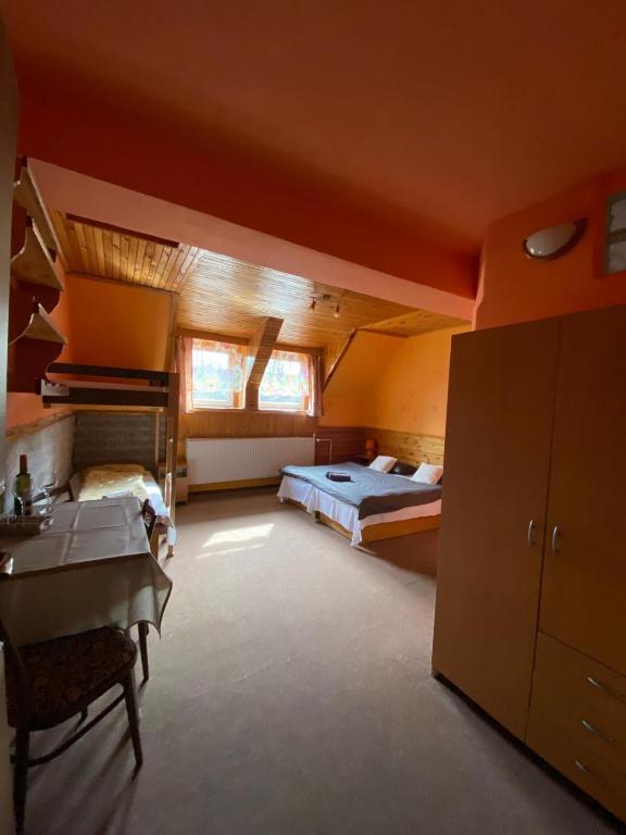 Postel nebo postele na pokoji v ubytování Penzión Skitour