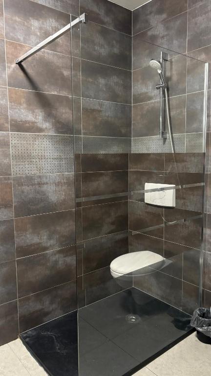 Koupelna v ubytování Hotel La Louve