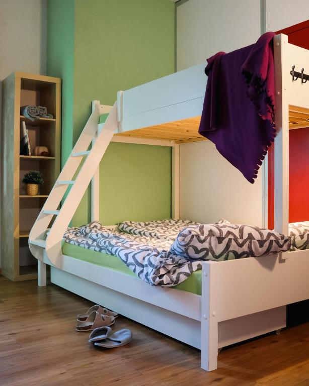 Postel nebo postele na pokoji v ubytování Backpacker Le Petit Baroudeur