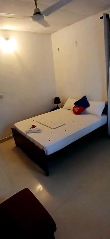 Postel nebo postele na pokoji v ubytování King Paradise by Hotel Oviniru