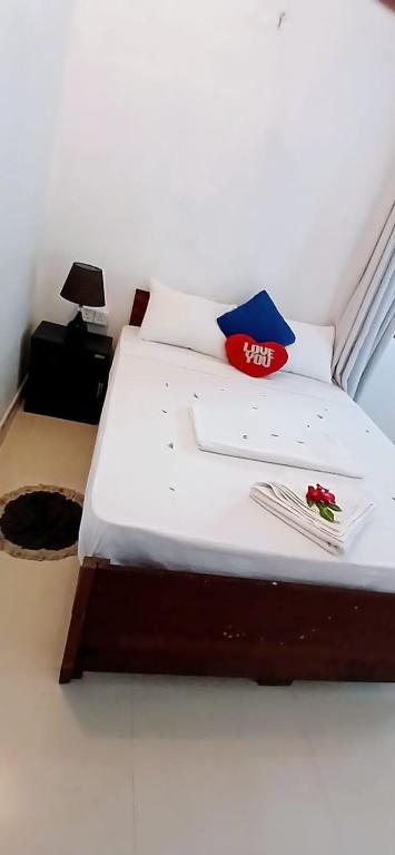 Postel nebo postele na pokoji v ubytování King Paradise by Hotel Oviniru