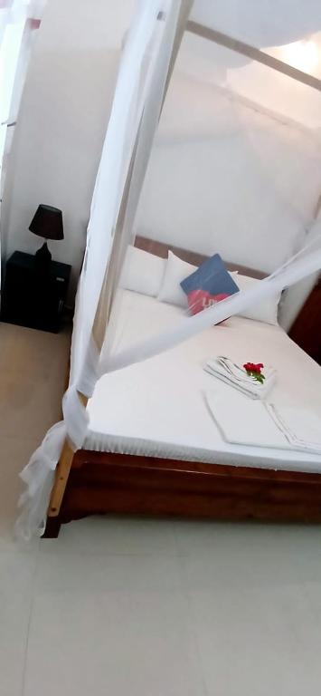 Postel nebo postele na pokoji v ubytování King Paradise by Hotel Oviniru