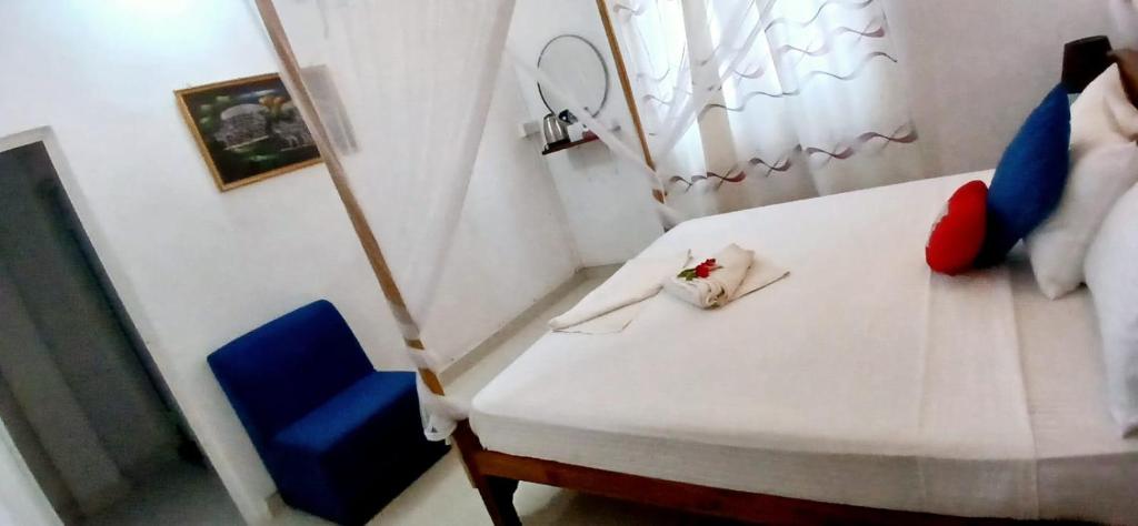 Postel nebo postele na pokoji v ubytování King Paradise by Hotel Oviniru