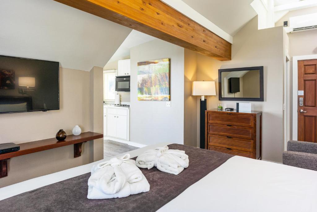 Postel nebo postele na pokoji v ubytování Bird Rock Hotel
