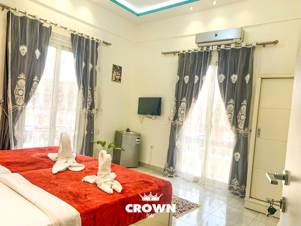 Postel nebo postele na pokoji v ubytování Crown Hotel in Cairo
