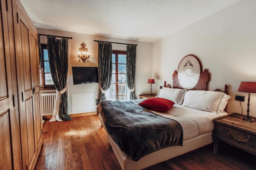 Postel nebo postele na pokoji v ubytování Locanda La Brenva - Estella Hotel Collection & Experience
