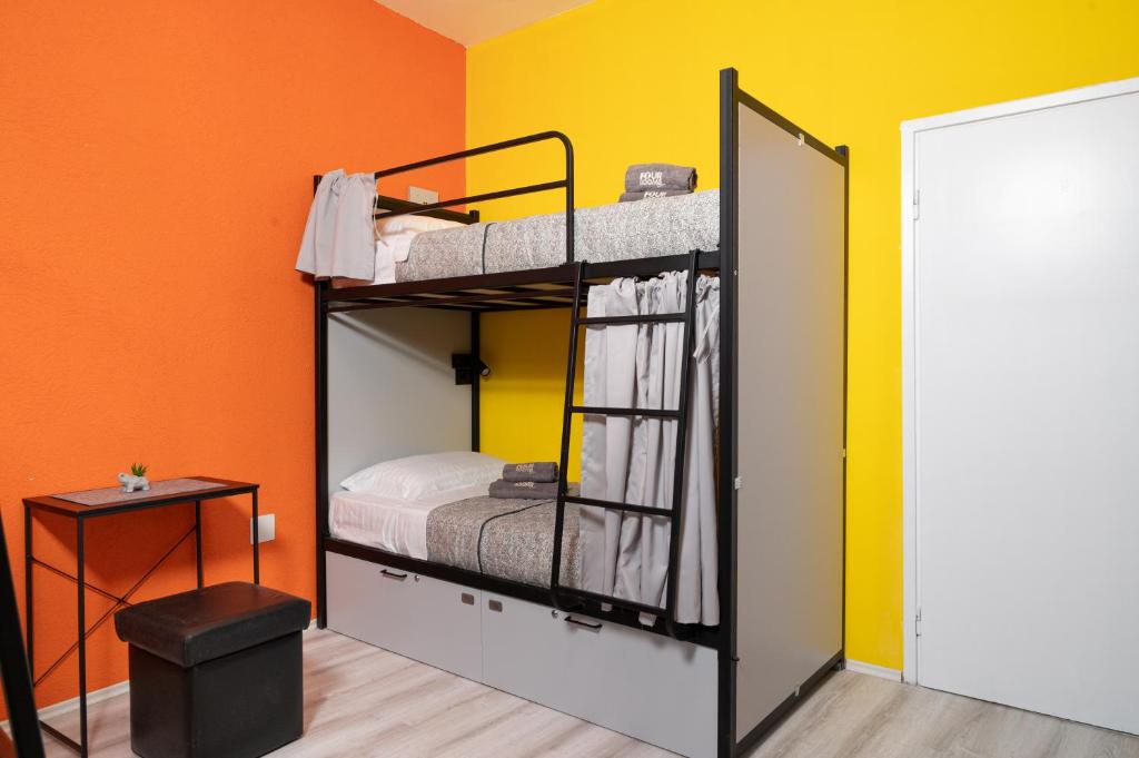 Voodi või voodid majutusasutuse Hostel Four Rooms toas