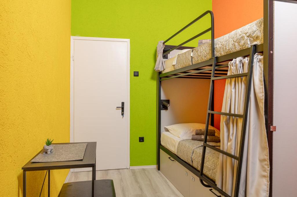 Voodi või voodid majutusasutuse Hostel Four Rooms toas