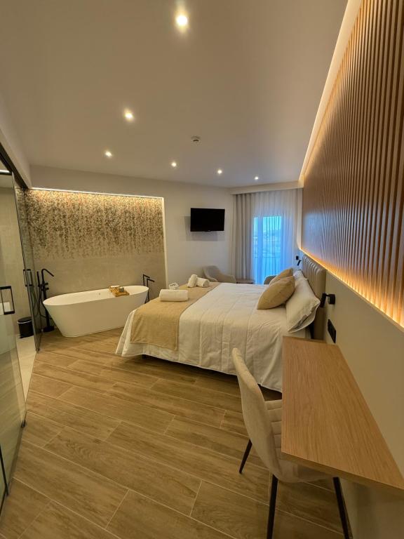 Postel nebo postele na pokoji v ubytování Hotel Siskets