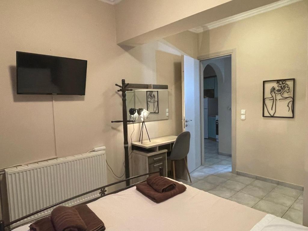 Postel nebo postele na pokoji v ubytování Ira Apartments