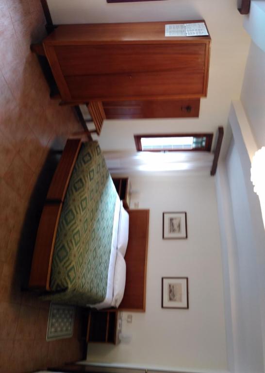 Postel nebo postele na pokoji v ubytování Albergo Al Gobbo