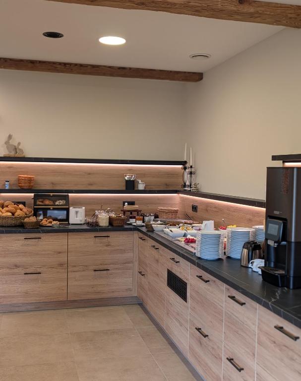 Kuchyň nebo kuchyňský kout v ubytování Gästehaus Arracher Hof