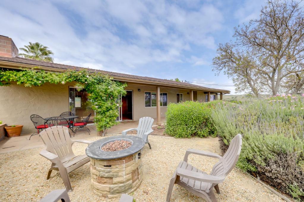 a patio with chairs and a table with a fire pit at Near Eats and Wineries Paso Robles Home with Patio! in Paso Robles