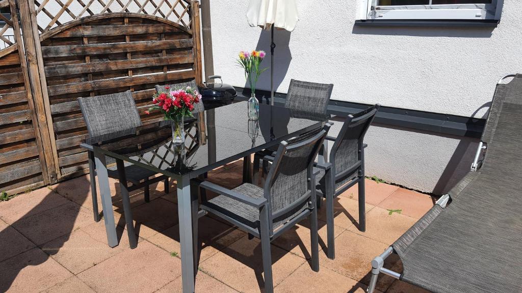 A seating area at Urlaubsapartment am Silbersee