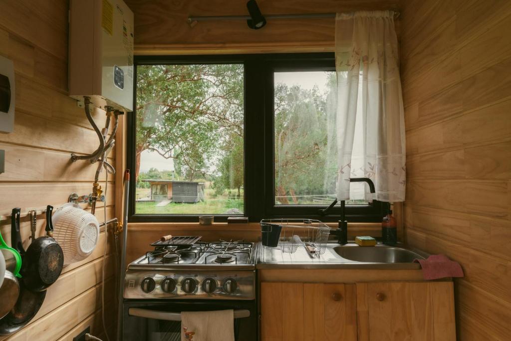 Una cocina o zona de cocina en Indómito Refugio