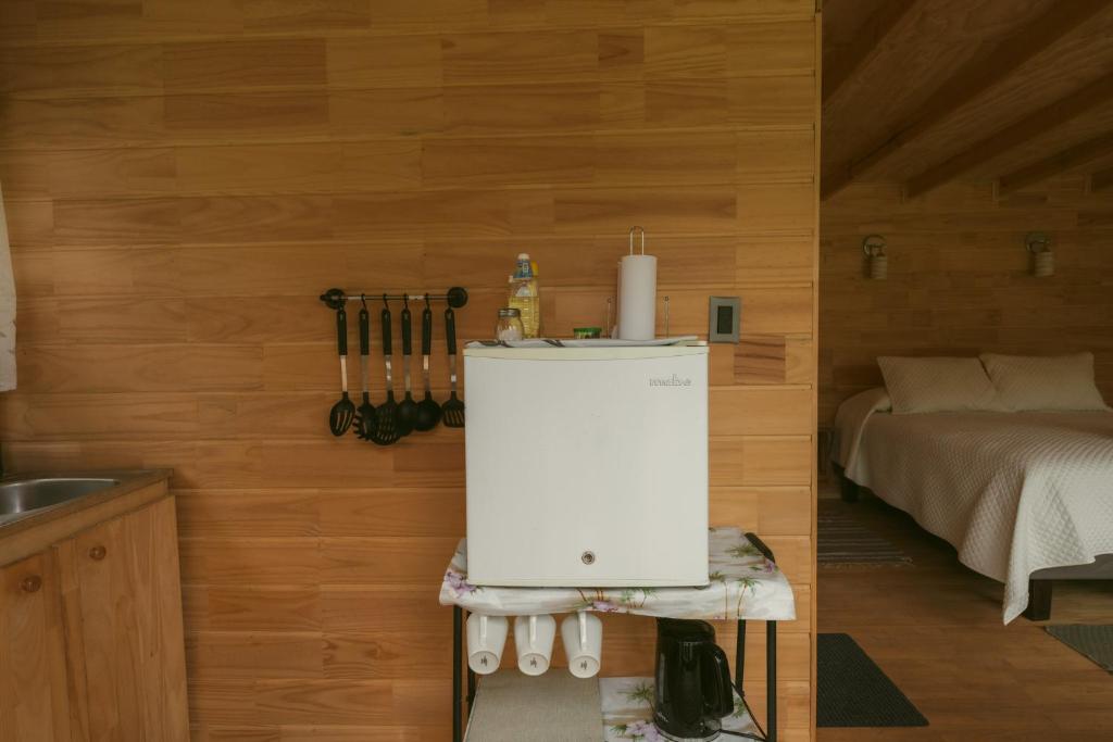 Cama o camas de una habitación en Indómito Refugio