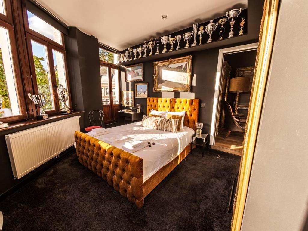 Postel nebo postele na pokoji v ubytování Le Palmarès - Brasserie & Hôtels