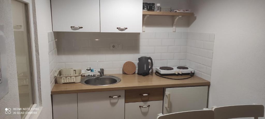 Kuhinja ili čajna kuhinja u objektu Apartmani Jovanovic