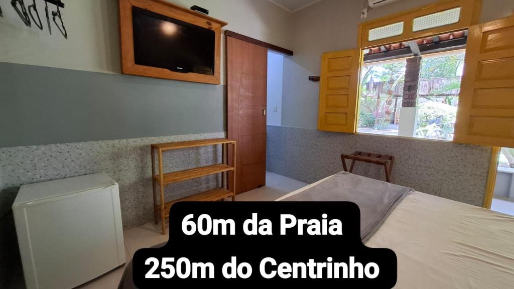 Giường trong phòng chung tại Coroaci Beach House