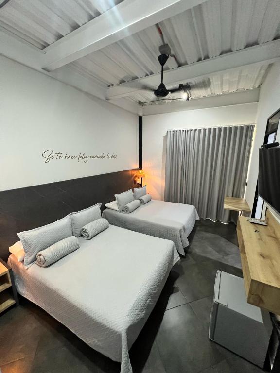 Postel nebo postele na pokoji v ubytování Hotel Capri Doradal