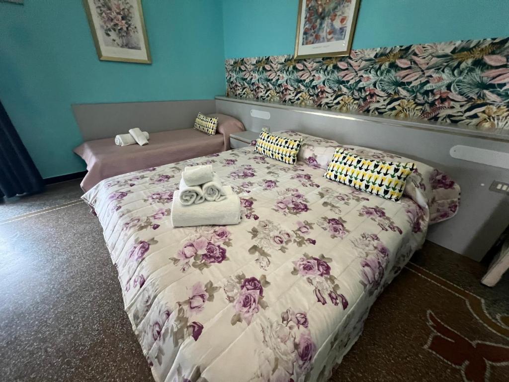 Postel nebo postele na pokoji v ubytování Hotel & Garden