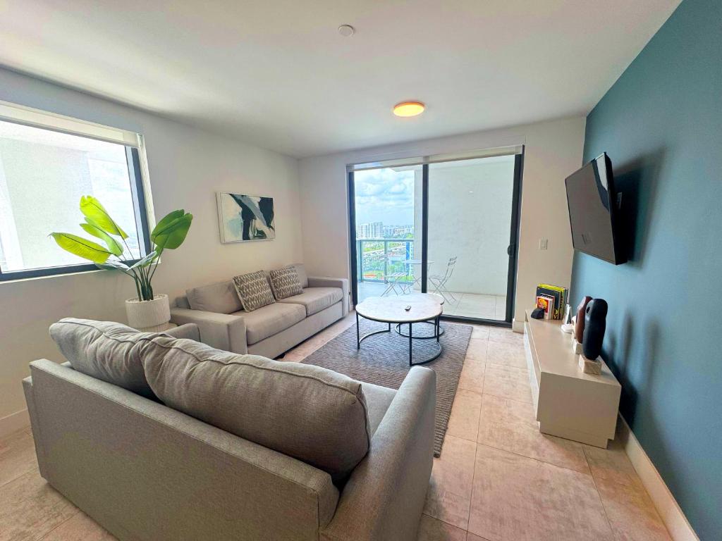 a living room with a couch and a table at Prime location: Luxury Condo at brickell in Miami