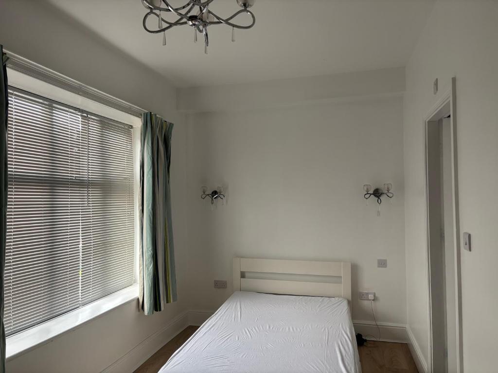 Postel nebo postele na pokoji v ubytování Ingoldsby rooms