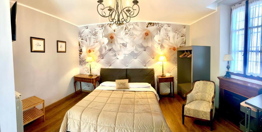 Łóżko lub łóżka w pokoju w obiekcie La Casa Di Campagna Sul Garda