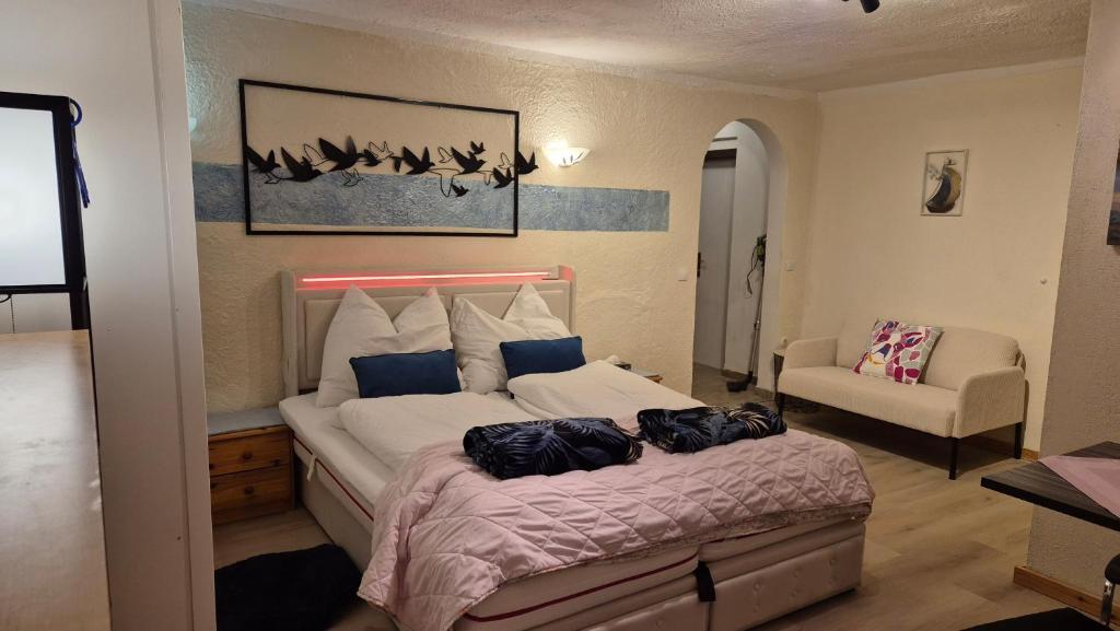 Postel nebo postele na pokoji v ubytování AlpinResort DerBacherhof