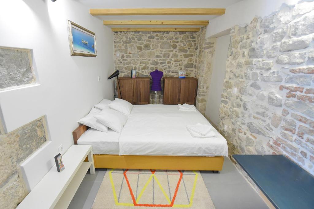 Posteľ alebo postele v izbe v ubytovaní Pylon Rooms