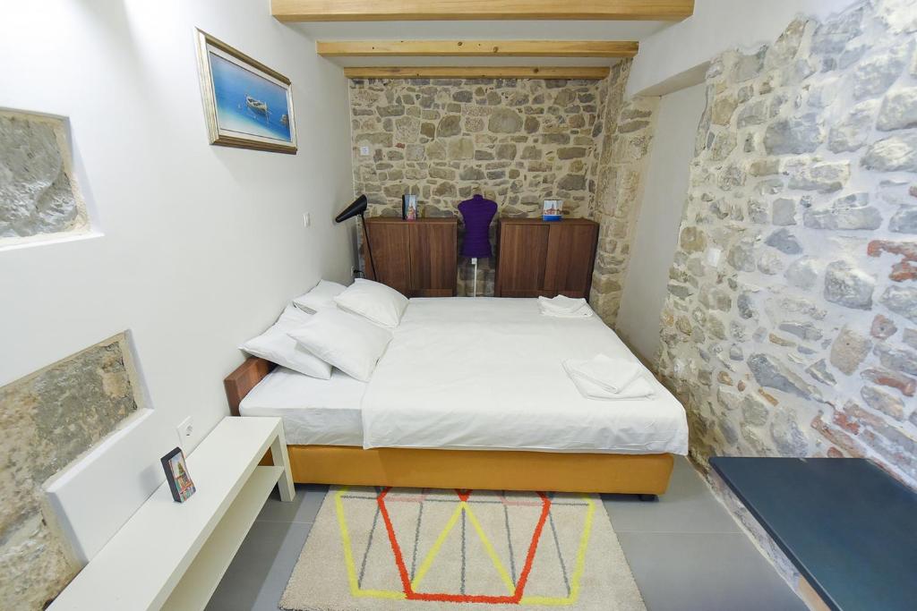 Posteľ alebo postele v izbe v ubytovaní Pylon Rooms