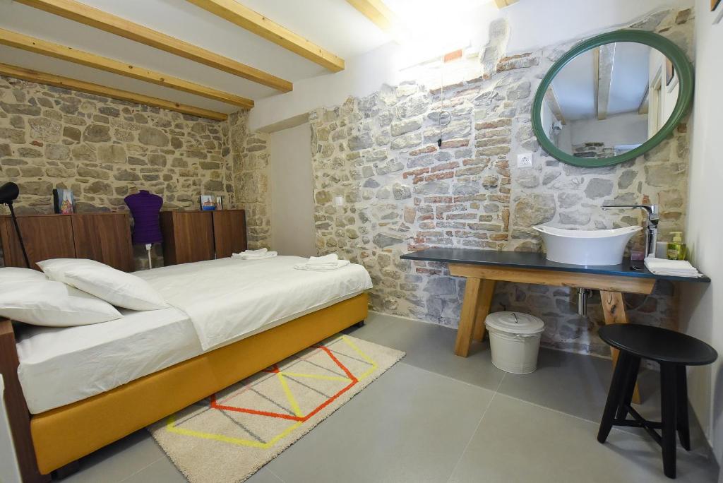 Posteľ alebo postele v izbe v ubytovaní Pylon Rooms