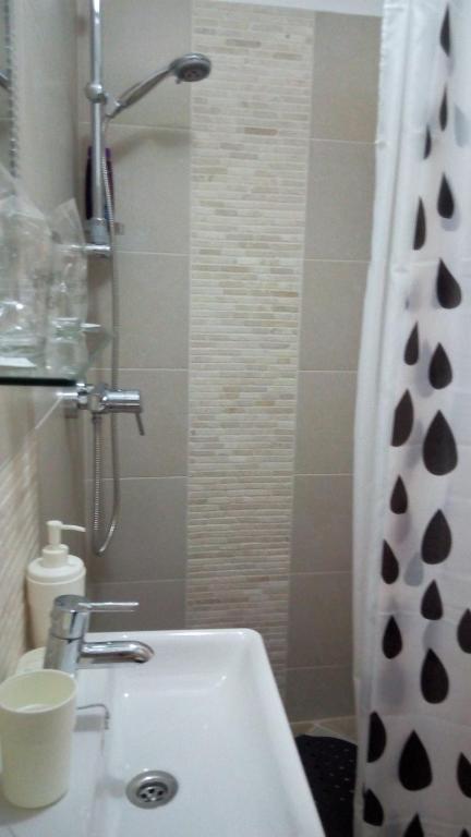 Koupelna v ubytování AMD Infinity Suites