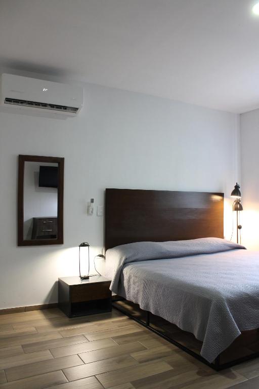 Postel nebo postele na pokoji v ubytování Lofts Las Fuentes