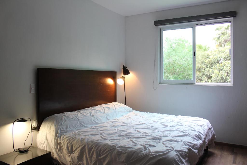 Postel nebo postele na pokoji v ubytování Lofts Las Fuentes