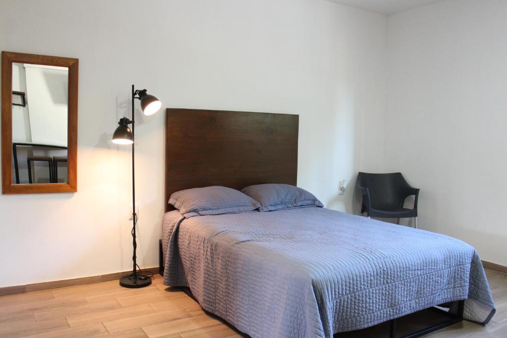 Postel nebo postele na pokoji v ubytování Lofts Las Fuentes