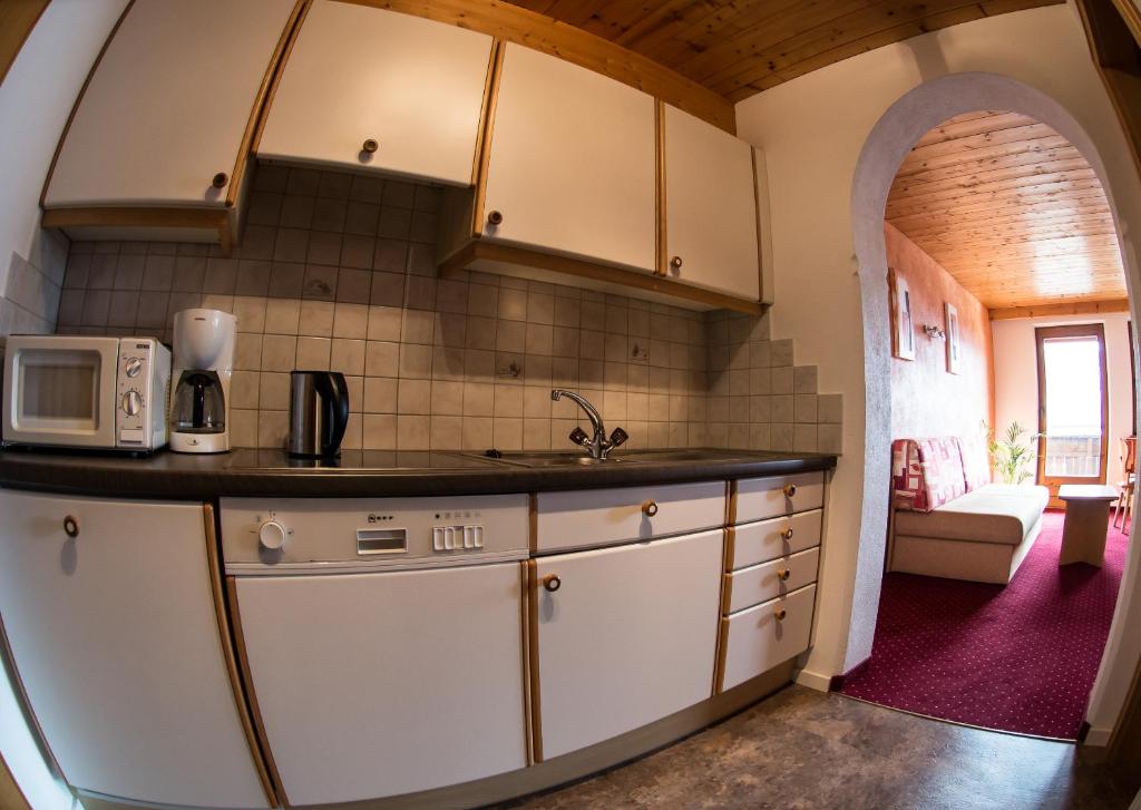 Kuchyň nebo kuchyňský kout v ubytování Haus Gerda