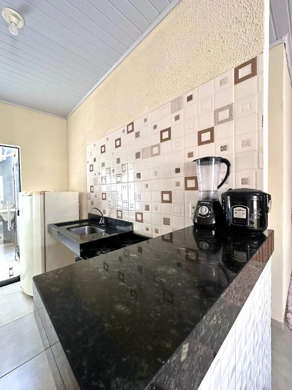 A cozinha ou kitchenette de Residencial Davisis - Parada do Jalapão
