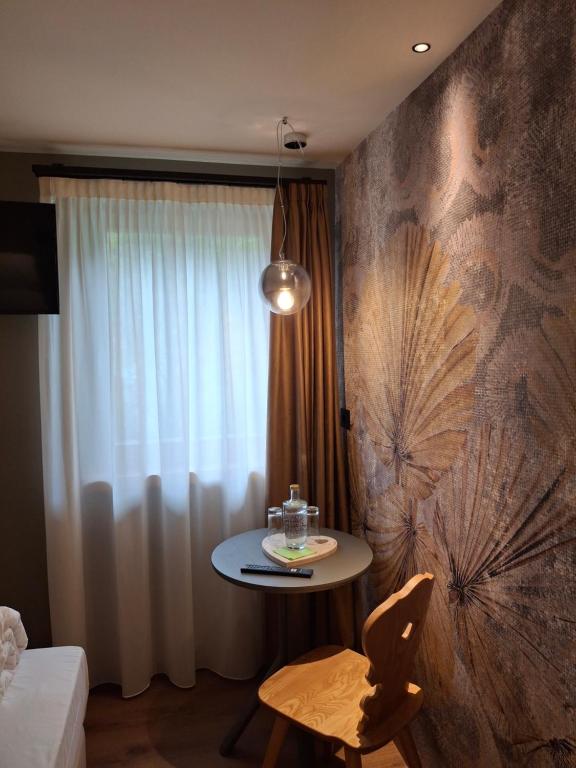 Posezení v ubytování Hotel Dolomiti Saone