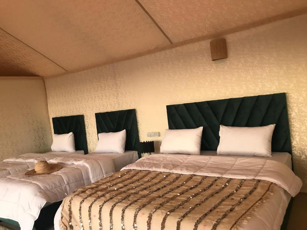 Postel nebo postele na pokoji v ubytování Quad Alia Marrakech