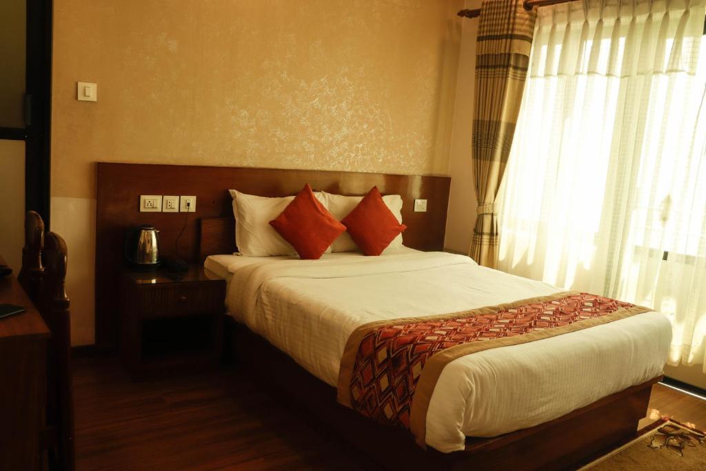 Postel nebo postele na pokoji v ubytování Bojinee Resort