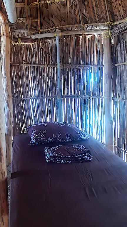 Uma cama ou camas num quarto em isla de san blas