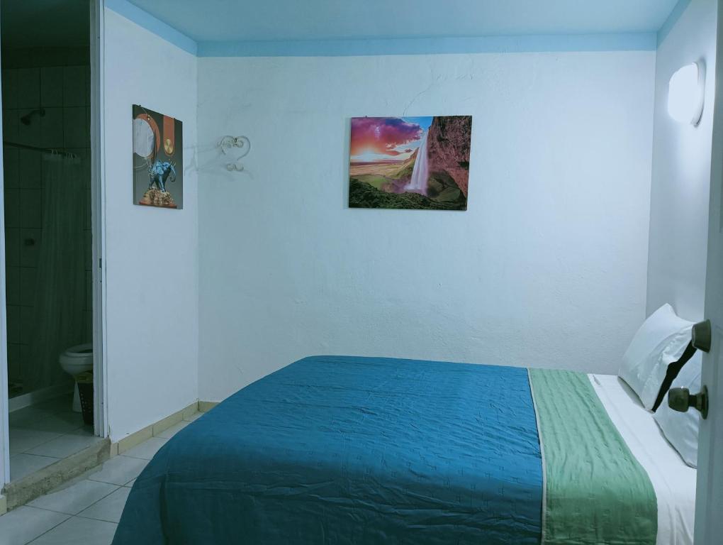 Postel nebo postele na pokoji v ubytování Alexandross
