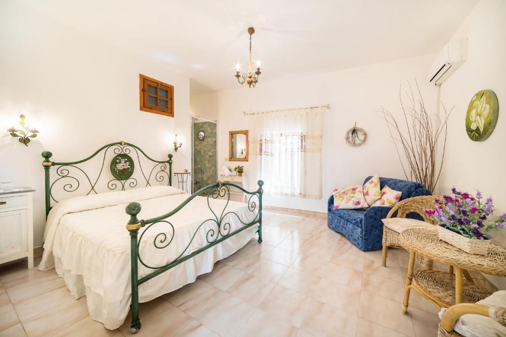 Posteľ alebo postele v izbe v ubytovaní B&B La Bouganville di Serena