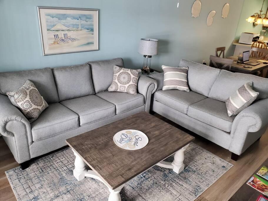 a living room with a couch and a coffee table at Seas the day llc in Myrtle Beach