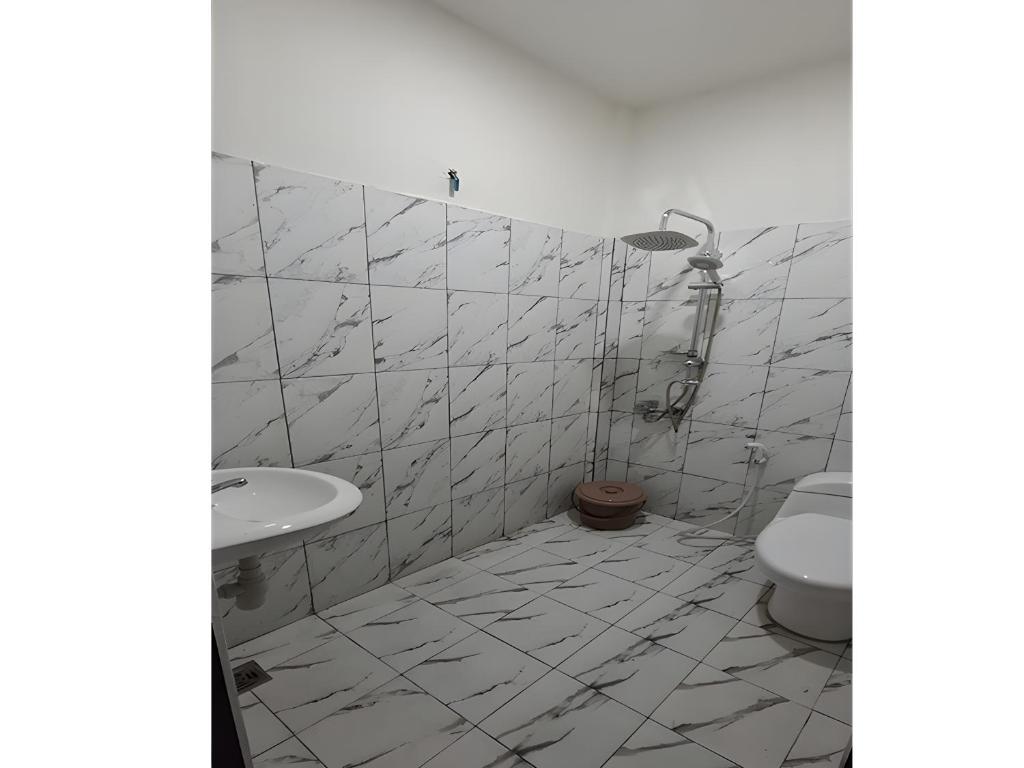 Koupelna v ubytování Homestay Sa'adah