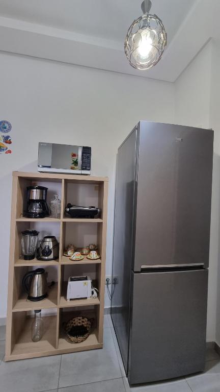 Kuchyň nebo kuchyňský kout v ubytování Appartement luxueux - Piscines, Plage 300m, Résidence fermée