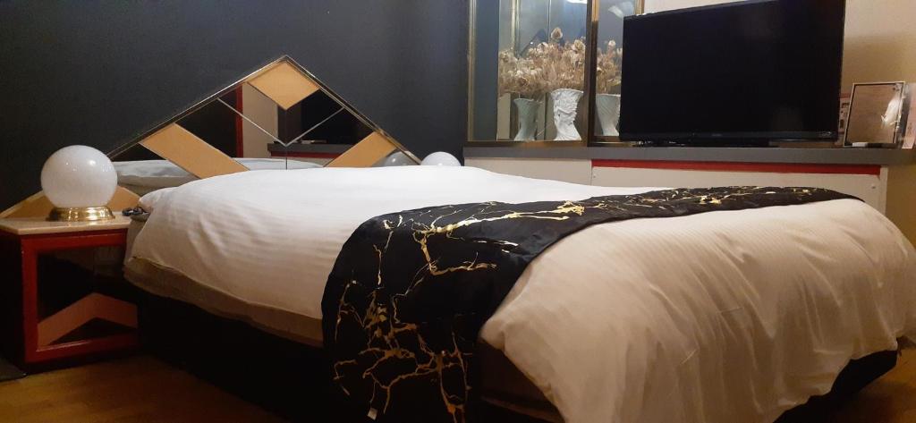 Postel nebo postele na pokoji v ubytování HOTEL MAX plus