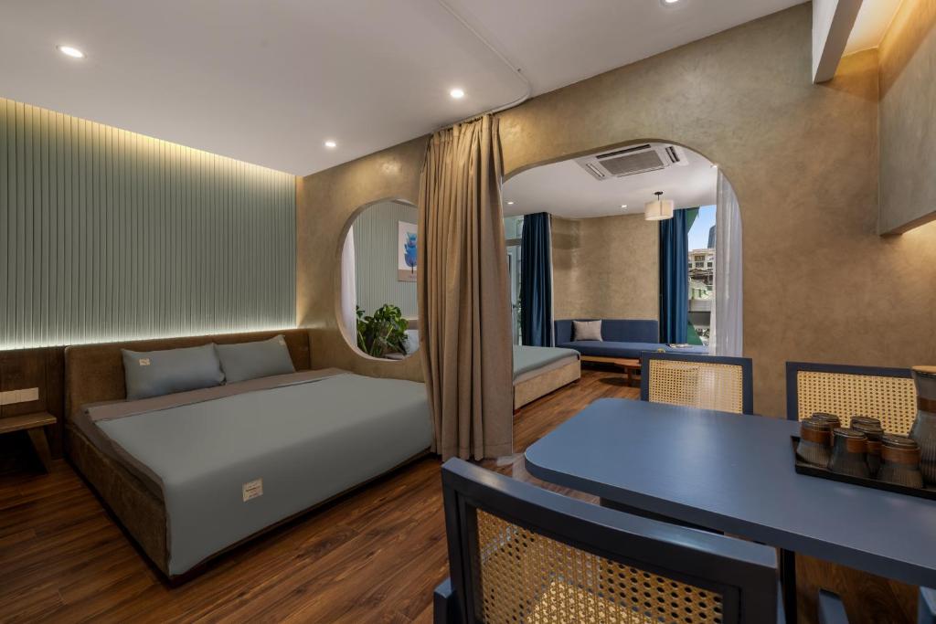 Postel nebo postele na pokoji v ubytování Q Apartment Da Nang