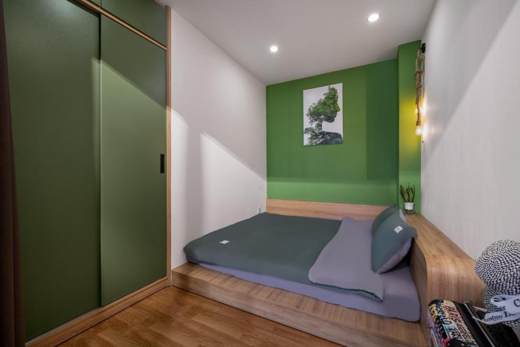 Postel nebo postele na pokoji v ubytování Q Apartment Da Nang